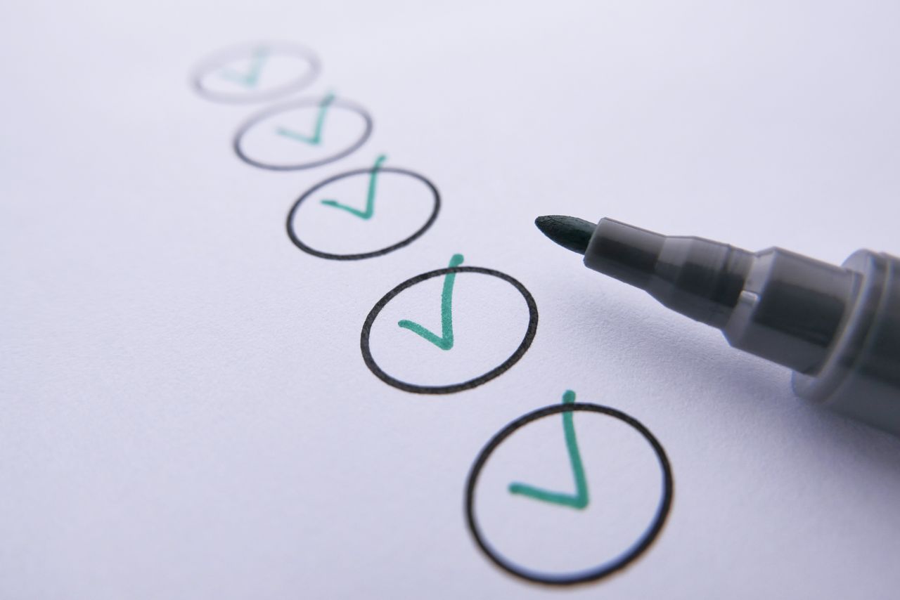 A manager reviewing a list of deals